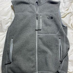 Lightly worn north face vests size XL